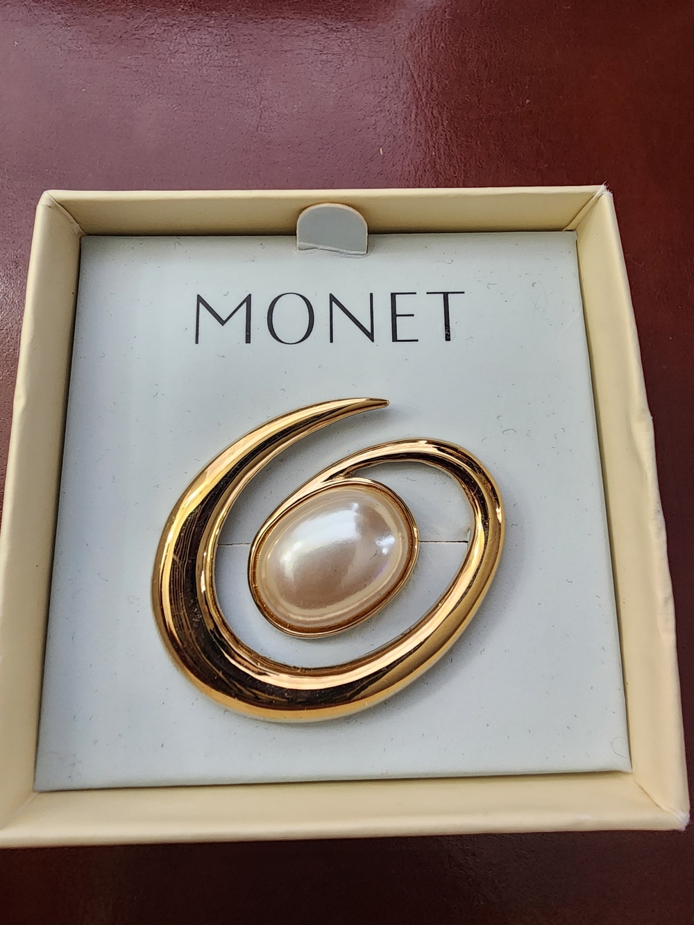 Monet Gold-Tone Swirl Brooch with Cream Pearl Cabochon